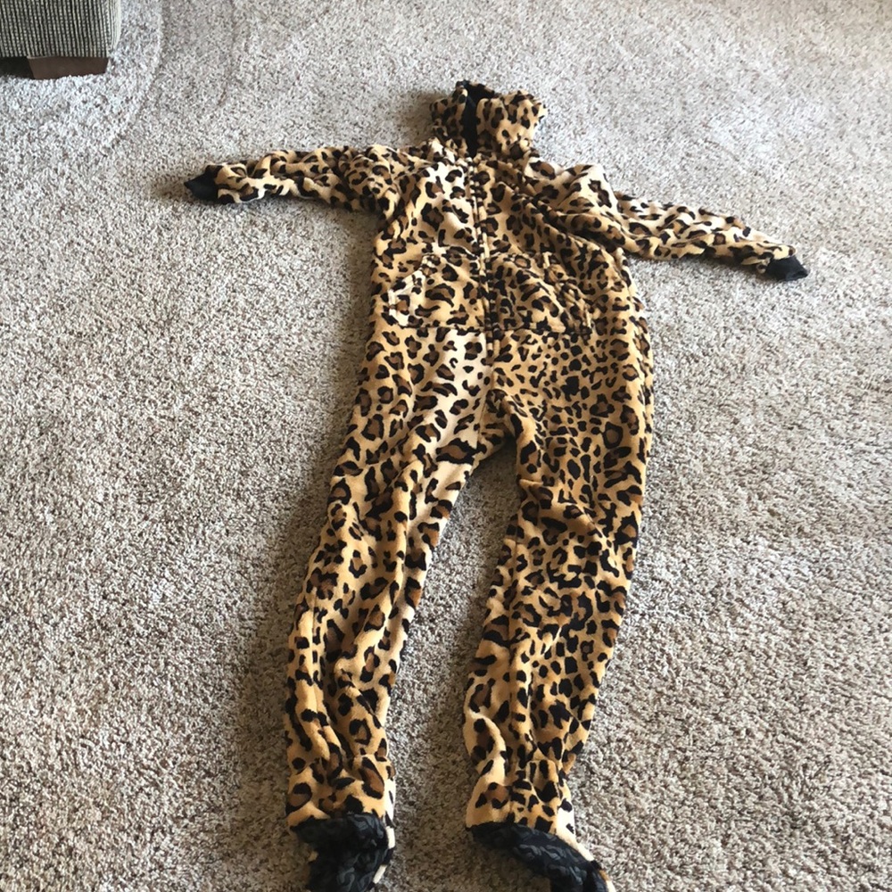 Leopard print footie pajamas/onesie. Never worn!